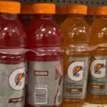 Row of Gatorade drinks on a shelf at a store