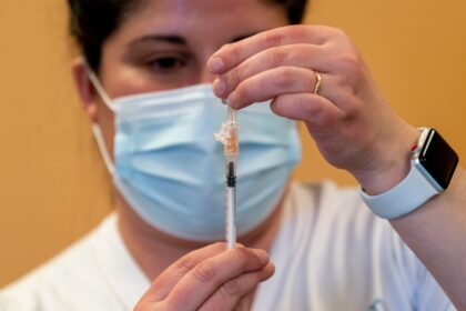 Biden, HHS to provide free Covid vaccines to the uninsured until 2024