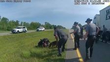 Police Officer Fired After Releasing Dog That Mauled Black Man