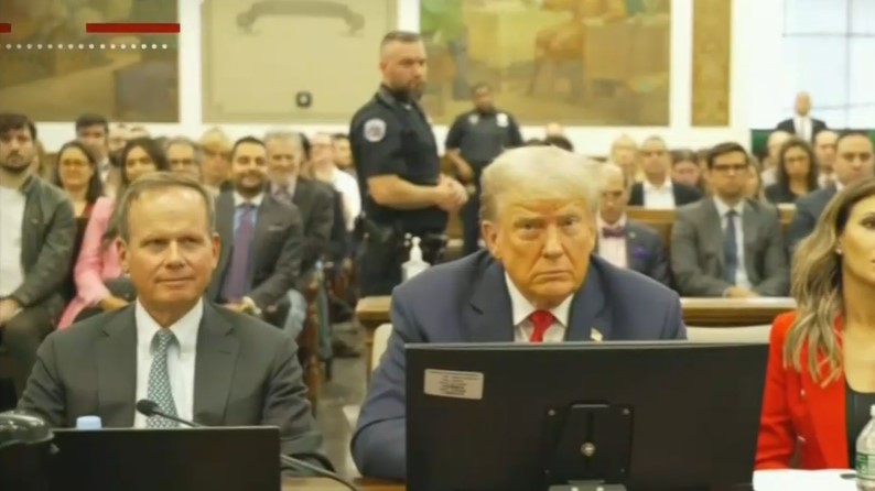 Trump sitting at the defense table during his New York fraud trial.