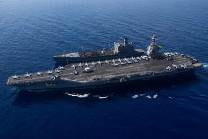 The USS Gerald R. Ford seen on Oct. 11 in the eastern Mediterranean Sea. The ship next to it is the USNS Laramie.