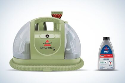 A Bissell Little Green carpet cleaner on a plain background