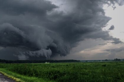 Storm coming in over farm field