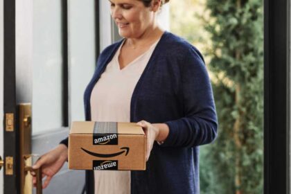 Woman holding Amazon box